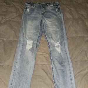 No boundaries lightly distressed high rise skinny button fly jeans
